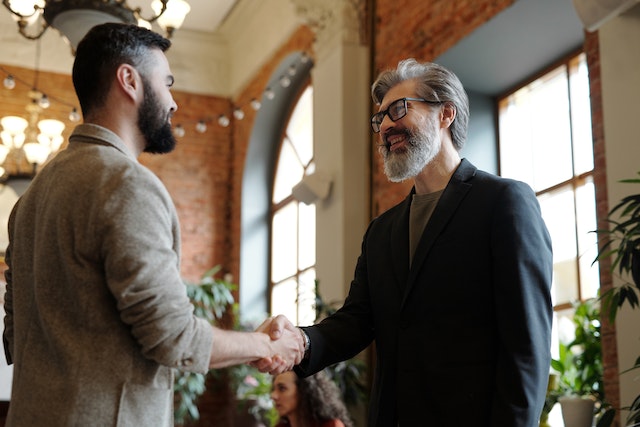 Two Person Handshaking